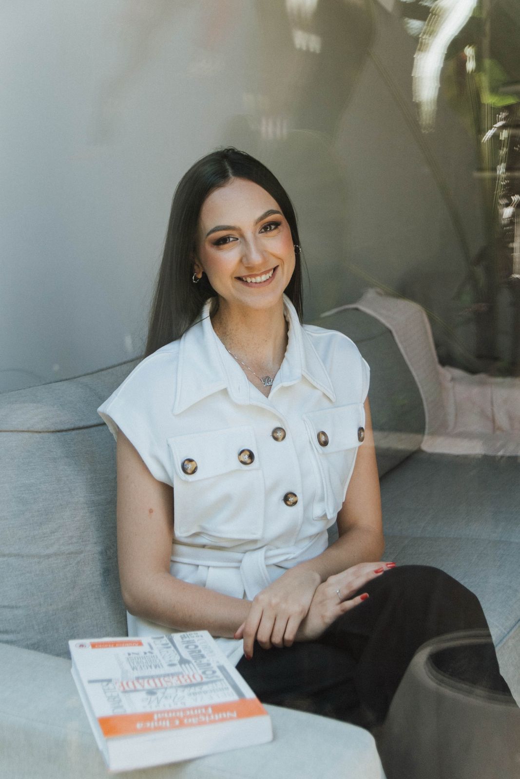 Patrícia Oliveira, nutricionista, sorrindo